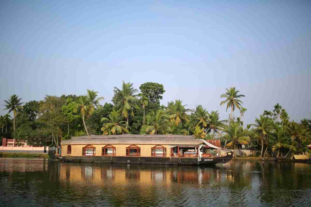 Traditional Kerala houseboat cruising through the scenic backwaters
