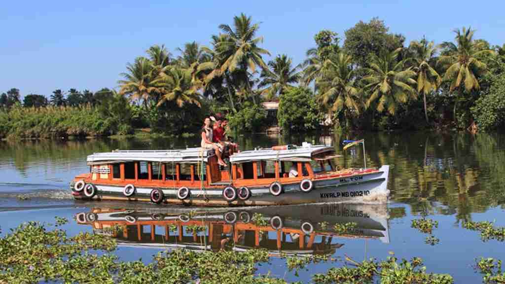 Traditional Kerala houseboat cruising through the backwaters