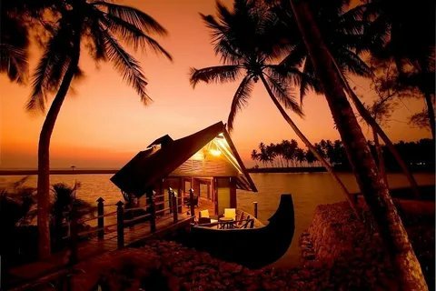 Kerala houseboat at sunset on the backwaters