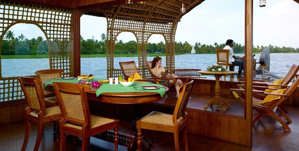 Kerala backwater resort dining area overlooking the water